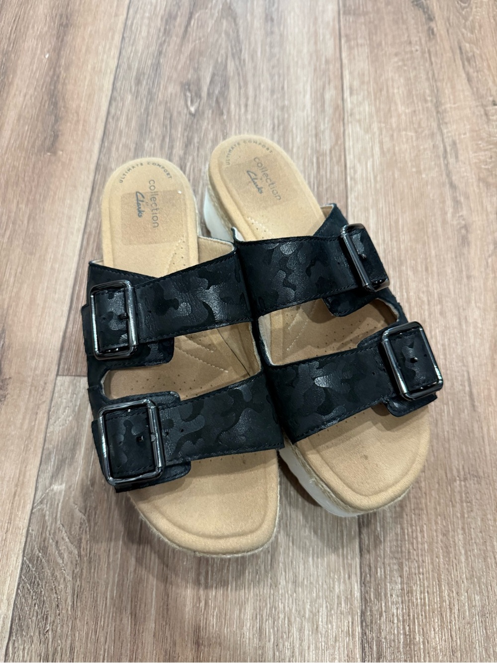 Clarks Black Slide Sandals with Tan Footbed